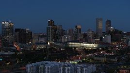 5.7K aerial stock footage flyby the convention center and city skyline at twilight, Downtown Denver, Colorado Aerial Stock Footage | DX0001_001601
