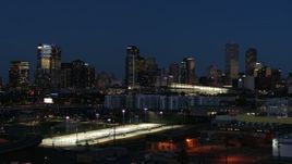 5.7K aerial stock footage of the city skyline at twilight during seen while flying low, Downtown Denver, Colorado Aerial Stock Footage | DX0001_001605