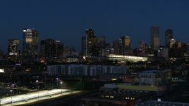 5.7K aerial stock footage of the city skyline and convention center at twilight, Downtown Denver, Colorado Aerial Stock Footage | DX0001_001606