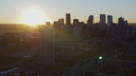 5.7K aerial stock footage of the city skyline at sunrise, seen from residential skyscraper in Downtown Denver, Colorado Aerial Stock Footage | DX0001_001613