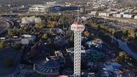 5.7K aerial stock footage flyby rides at Elitch Gardens at sunrise in Downtown Denver, Colorado Aerial Stock Footage | DX0001_001633