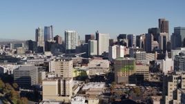 5.7K aerial stock footage reverse and flyby the city's skyline, seen from office buildings in Downtown Denver, Colorado Aerial Stock Footage | DX0001_001661