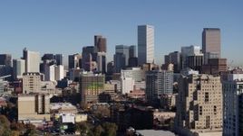 5.7K aerial stock footage of the city's skyline, seen from office buildings before descent in Downtown Denver, Colorado Aerial Stock Footage | DX0001_001666