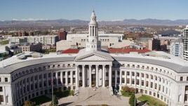5.7K aerial stock footage of flying by the Denver City Council building, Downtown Denver, Colorado Aerial Stock Footage | DX0001_001693