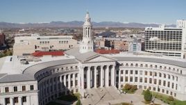 5.7K aerial stock footage of passing the Denver City Council building while ascending, Downtown Denver, Colorado Aerial Stock Footage | DX0001_001695