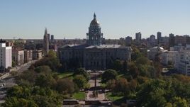 5.7K aerial stock footage descend toward park while focusing on Colorado State Capitol, Downtown Denver, Colorado Aerial Stock Footage | DX0001_001701