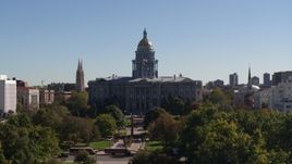 5.7K aerial stock footage flyby the Colorado State Capitol during ascent from park, Downtown Denver, Colorado Aerial Stock Footage | DX0001_001708
