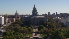 5.7K aerial stock footage flyby the Colorado State Capitol during during descent toward trees, Downtown Denver, Colorado Aerial Stock Footage | DX0001_001709