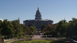 5.7K aerial stock footage ascending toward the Colorado State Capitol from park, Downtown Denver, Colorado Aerial Stock Footage | DX0001_001714