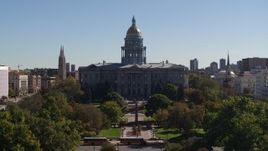 5.7K aerial stock footage reverse view of the Colorado State Capitol during descent to park, Downtown Denver, Colorado Aerial Stock Footage | DX0001_001715