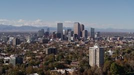5.7K aerial stock footage of the city's skyline and mountains in the background, Downtown Denver, Colorado Aerial Stock Footage | DX0001_001720