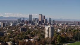 5.7K aerial stock footage the city's skyline, with the mountains in background, Downtown Denver, Colorado Aerial Stock Footage | DX0001_001735