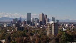 5.7K aerial stock footage pass the city's skyline before ascending, Downtown Denver, Colorado Aerial Stock Footage | DX0001_001737