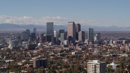 5.7K aerial stock footage passing the city's skyline with mountains in background, Downtown Denver, Colorado Aerial Stock Footage | DX0001_001738