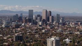 5.7K aerial stock footage of focusing on the city's skyline with mountains in distance, Downtown Denver, Colorado Aerial Stock Footage | DX0001_001745