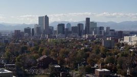 5.7K aerial stock footage of the city's skyline with Rockies in the background during descent, Downtown Denver, Colorado Aerial Stock Footage | DX0001_001756