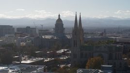 5.7K aerial stock footage of the Colorado State Capitol and a nearby cathedral, Downtown Denver, Colorado Aerial Stock Footage | DX0001_001762
