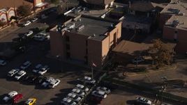 5.7K aerial stock footage approach and flyby a brick police station in Denver, Colorado Aerial Stock Footage | DX0001_001766