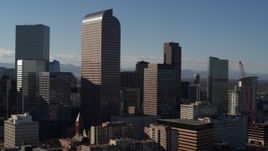 5.7K aerial stock footage flying by Wells Fargo Center and nearby skyscrapers in Downtown Denver, Colorado Aerial Stock Footage | DX0001_001772