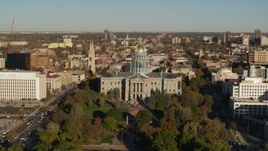 5.7K aerial stock footage reverse and flyby the Colorado State Capitol and tree-lined park in Downtown Denver, Colorado Aerial Stock Footage | DX0001_001788