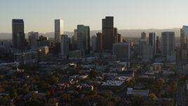 5.7K aerial stock footage slowly flying by the skyline at sunset in Downtown Denver, Colorado Aerial Stock Footage | DX0001_001809