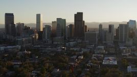 5.7K aerial stock footage slowly passing by the skyline at sunset in Downtown Denver, Colorado Aerial Stock Footage | DX0001_001810