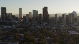 5.7K aerial stock footage slowly descend and flyby the skyline at sunset, Downtown Denver, Colorado Aerial Stock Footage | DX0001_001811