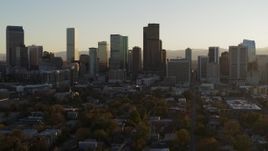 5.7K aerial stock footage slowly descend while focusing on the skyline at sunset, Downtown Denver, Colorado Aerial Stock Footage | DX0001_001815