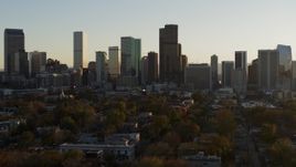 5.7K aerial stock footage a slow pass by the skyline before ascent at sunset, Downtown Denver, Colorado Aerial Stock Footage | DX0001_001817