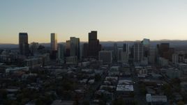 5.7K aerial stock footage of approaching the city skyline at sunset, Downtown Denver, Colorado Aerial Stock Footage | DX0001_001826