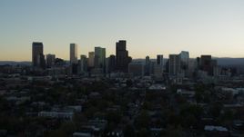 5.7K aerial stock footage ascend while approaching the city skyline at sunset, Downtown Denver, Colorado Aerial Stock Footage | DX0001_001828