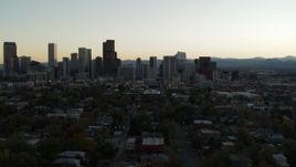 5.7K aerial stock footage approach of the city skyline at sunset during ascent, Downtown Denver, Colorado Aerial Stock Footage | DX0001_001839