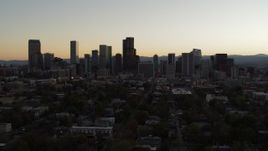 5.7K aerial stock footage slow ascent while flying by the city's skyline at sunset, Downtown Denver, Colorado Aerial Stock Footage | DX0001_001851