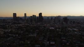 5.7K aerial stock footage slowly flying away from the city's skyline at sunset, Downtown Denver, Colorado Aerial Stock Footage | DX0001_001853