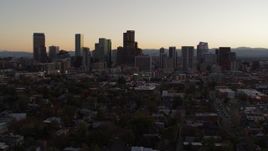 5.7K aerial stock footage of passing the city's skyline at sunset, Downtown Denver, Colorado Aerial Stock Footage | DX0001_001858