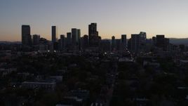 5.7K aerial stock footage ascend and approach the city's skyline at twilight, Downtown Denver, Colorado Aerial Stock Footage | DX0001_001861