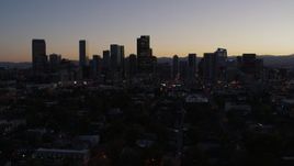 5.7K aerial stock footage ascend and approach the city's skyline at twilight, Downtown Denver, Colorado Aerial Stock Footage | DX0001_001866