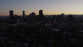 5.7K aerial stock footage fly away from the city's skyline at twilight and ascend, Downtown Denver, Colorado Aerial Stock Footage | DX0001_001867