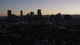 5.7K aerial stock footage of the city's skyline at twilight during descent, Downtown Denver, Colorado Aerial Stock Footage | DX0001_001870