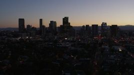 5.7K aerial stock footage of passing the city's skyline at twilight during slow ascent, Downtown Denver, Colorado Aerial Stock Footage | DX0001_001872