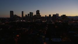 5.7K aerial stock footage ascend and approach the city's skyline at twilight, Downtown Denver, Colorado Aerial Stock Footage | DX0001_001886