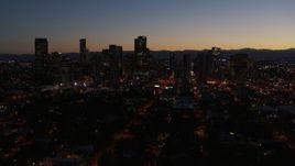 5.7K aerial stock footage of the city's skyline at twilight while ascending, Downtown Denver, Colorado Aerial Stock Footage | DX0001_001888