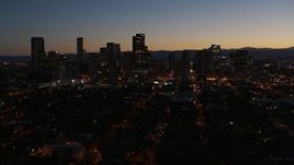 5.7K aerial stock footage descend while focusing on the city's skyline at twilight while ascending, Downtown Denver, Colorado Aerial Stock Footage | DX0001_001889