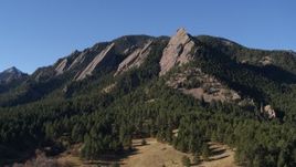 5.7K aerial stock footage of passing by the flatirons on the side of Green Mountain in the Rocky Mountains, Colorado Aerial Stock Footage | DX0001_001898