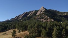 5.7K aerial stock footage of flying by trees and Green Mountain's flatirons in the Rocky Mountains, Colorado Aerial Stock Footage | DX0001_001902