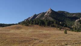 5.7K aerial stock footage of reverse view of Green Mountain's flatirons before descending in the Rocky Mountains, Colorado Aerial Stock Footage | DX0001_001903