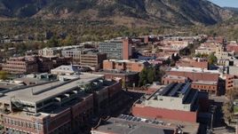 5.7K aerial stock footage of flying away from brick office buildings in Boulder, Colorado Aerial Stock Footage | DX0001_001912
