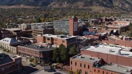 5.7K aerial stock footage focus on tall brick office building in Boulder, Colorado Aerial Stock Footage | DX0001_001915