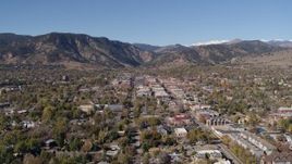 5.7K aerial stock footage ascend to stationary view of Boulder, Colorado with mountains in background Aerial Stock Footage | DX0001_001918