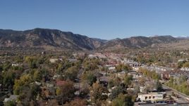 5.7K aerial stock footage ascend and flyby Boulder, Colorado with mountains in background Aerial Stock Footage | DX0001_001920